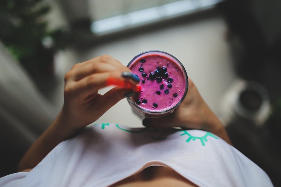 Girl holding yoghurt