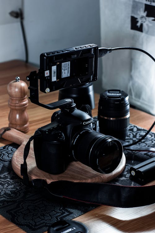 Free A Camera on a Wooden Board Stock Photo