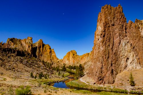 Free Beautiful geological formations at Smith Rock State Park with river and clear blue sky. Stock Photo