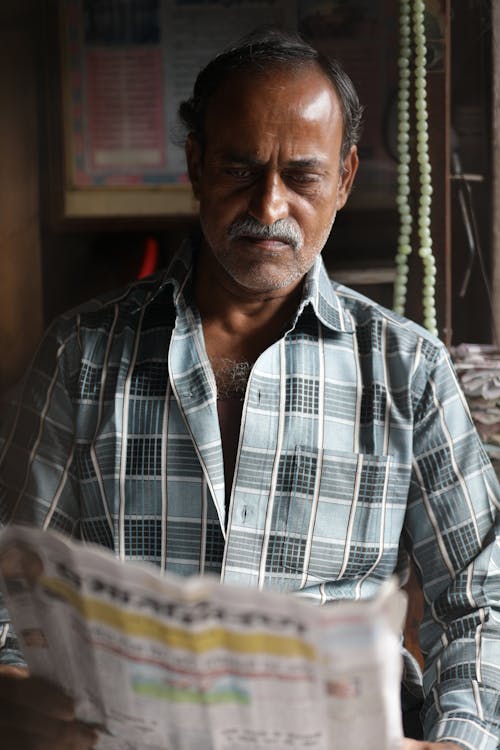Man Reading a Newspaper