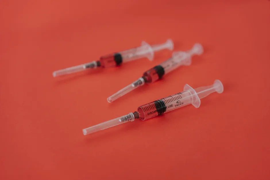 Medical professional preparing a vitamin B12 injection