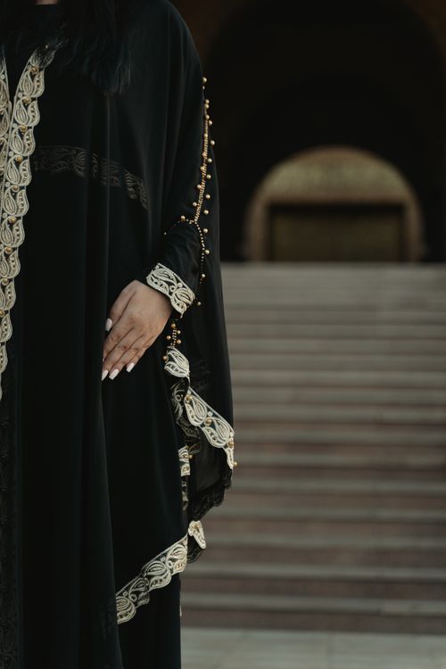 Someone Wearing Robe A Close-Up Shot of a Person Wearing a Black Robe · Free Stock Photo