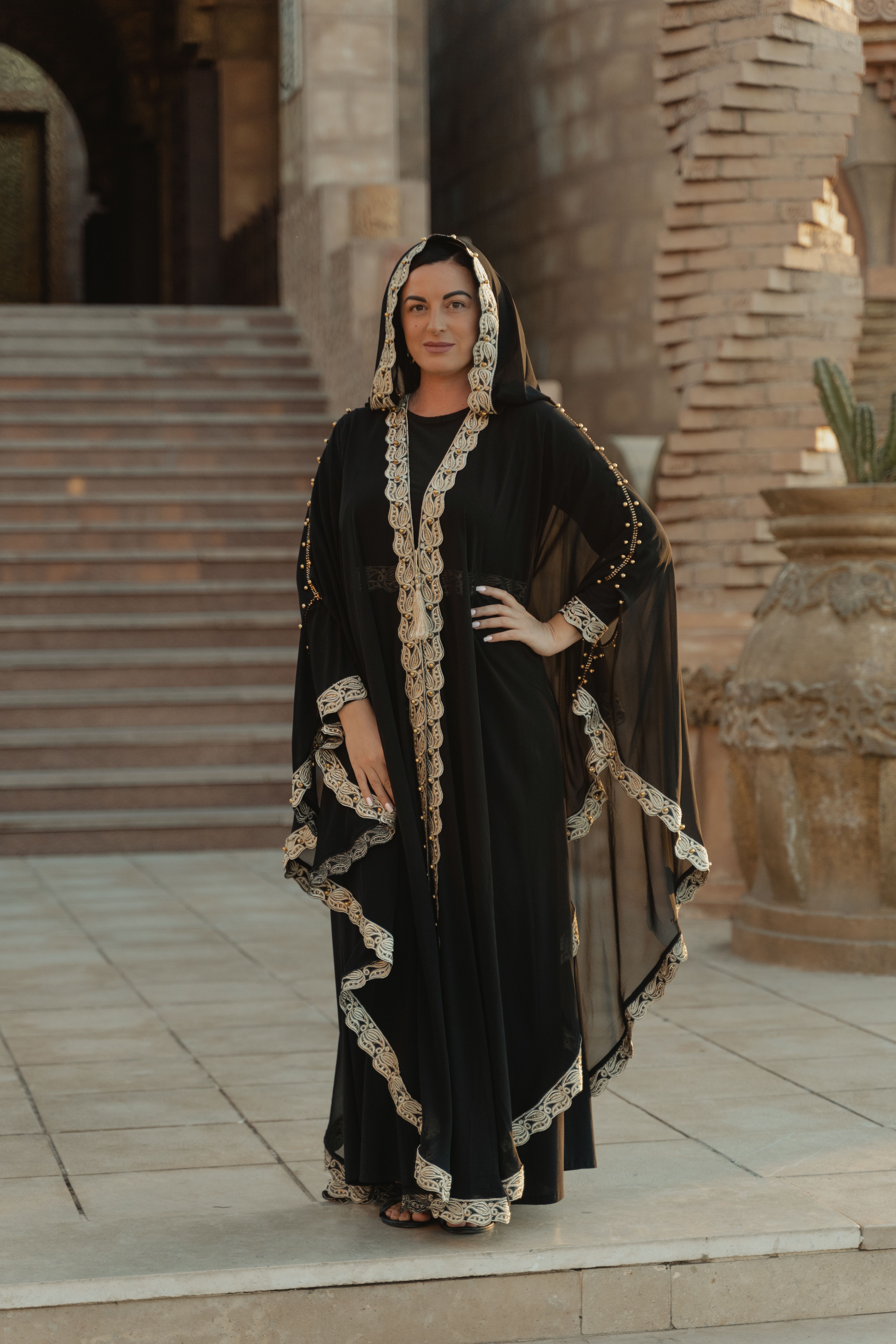 A Woman Wearing a Black Robe · Free Stock Photo