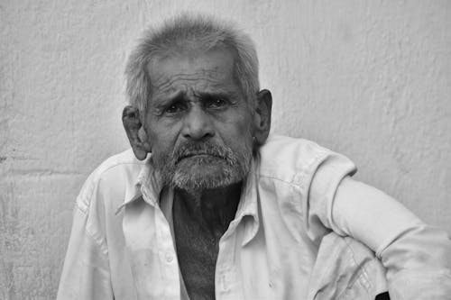 Free Grayscale Photography of an Elderly Man Stock Photo