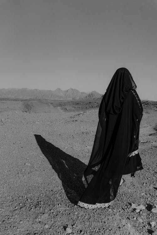Woman Walking on the Desert