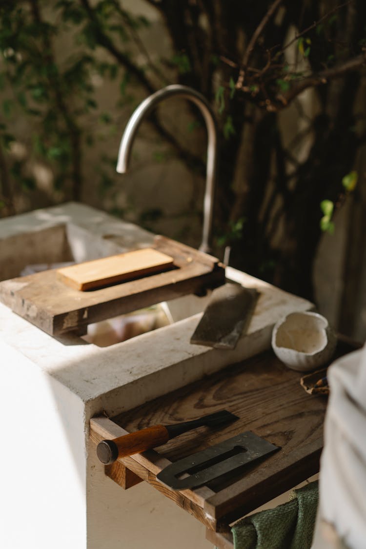 Joinery Tools And Wooden Blocks On Old Sink