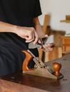 Crop man with knife and jointer