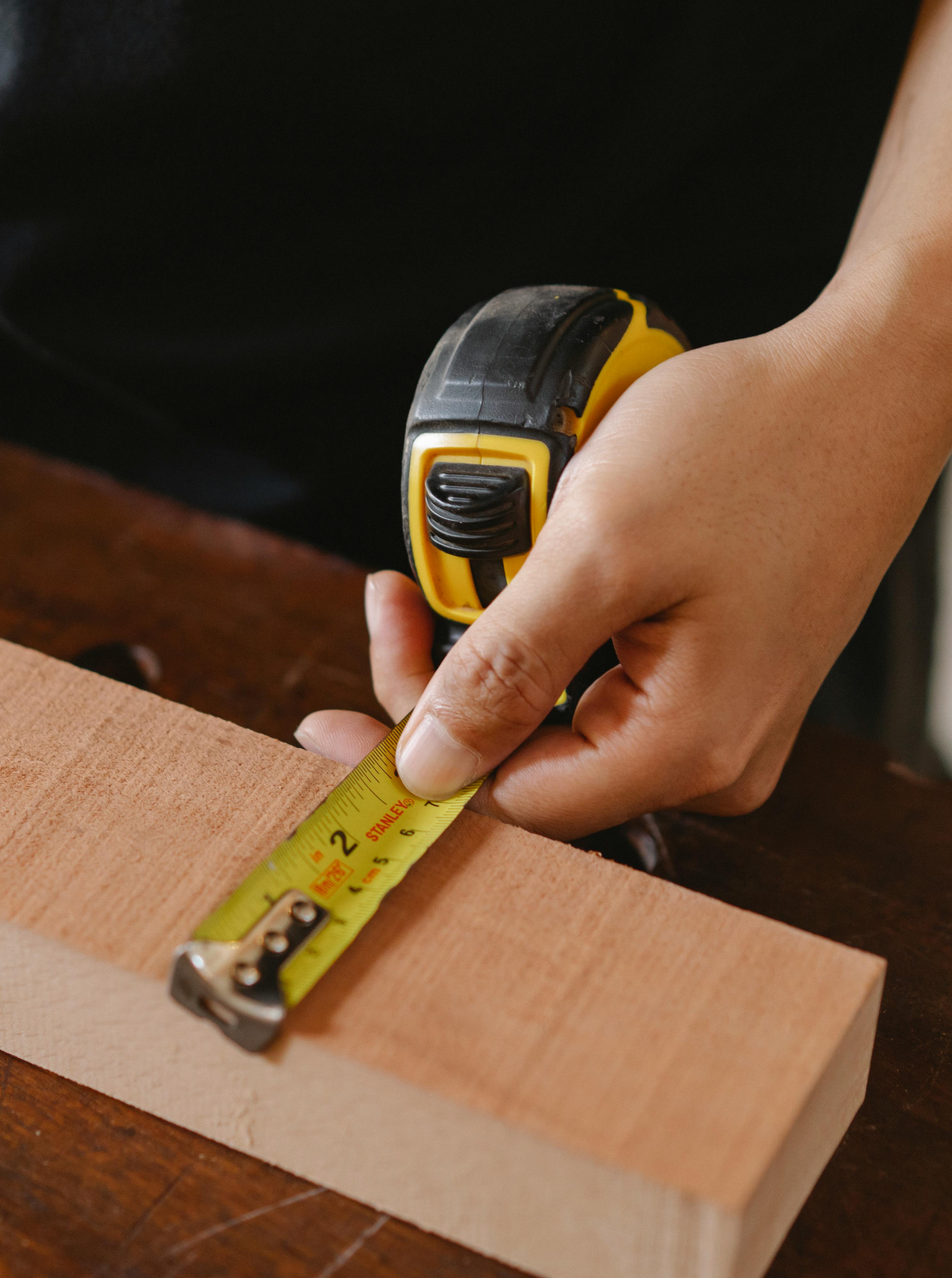 crop man with measuring tool