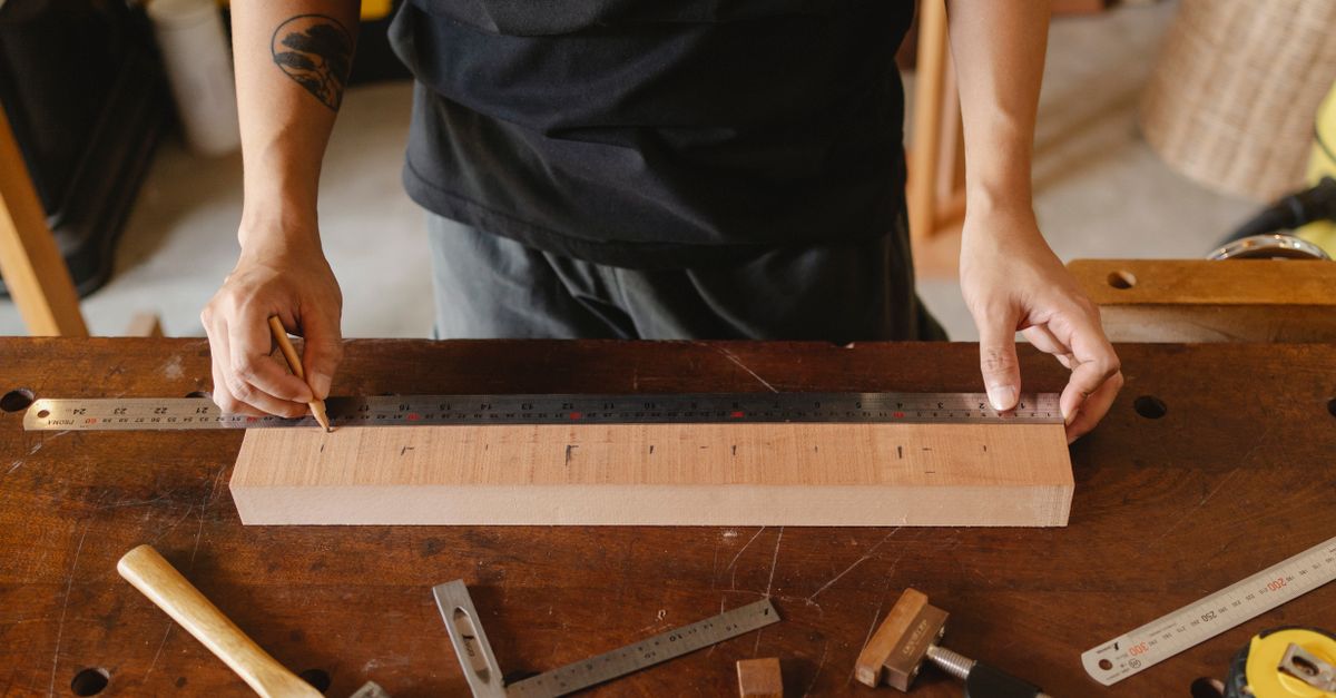 Set of measuring tools on a workbench representing free and paid methods to check competitor web traffic