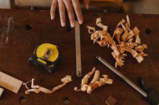 Video thumbnail — woodworker laying out a joint with marking tools, photo by Ono Kosuki on Pexels