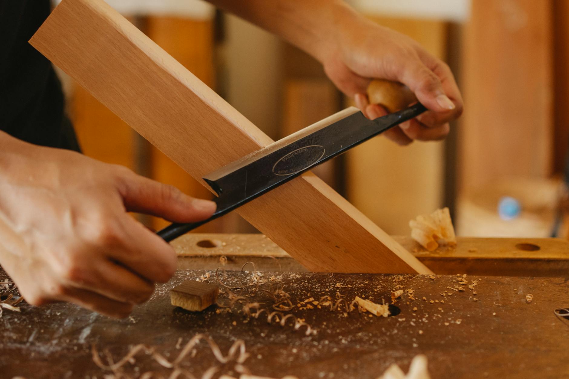 Joiner cutting hardwood with a hand tool