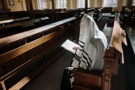 White Textile on Brown Wooden Bench