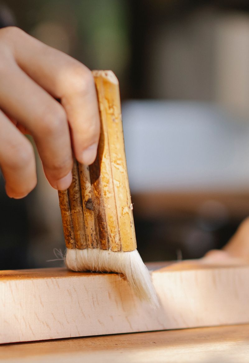 Close-up of hand-finishing the residence oak details
