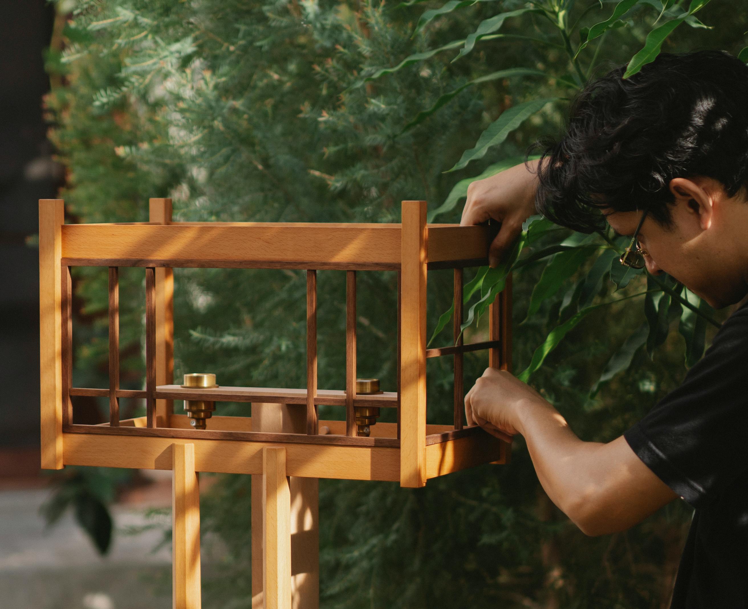 concentrated man making bird feeder