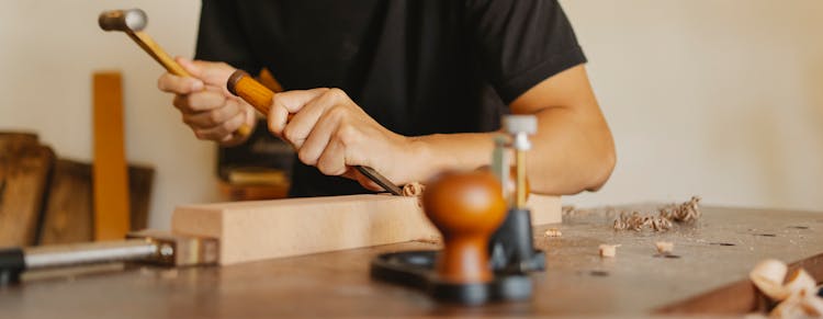 Person Using Tools In Woodworking