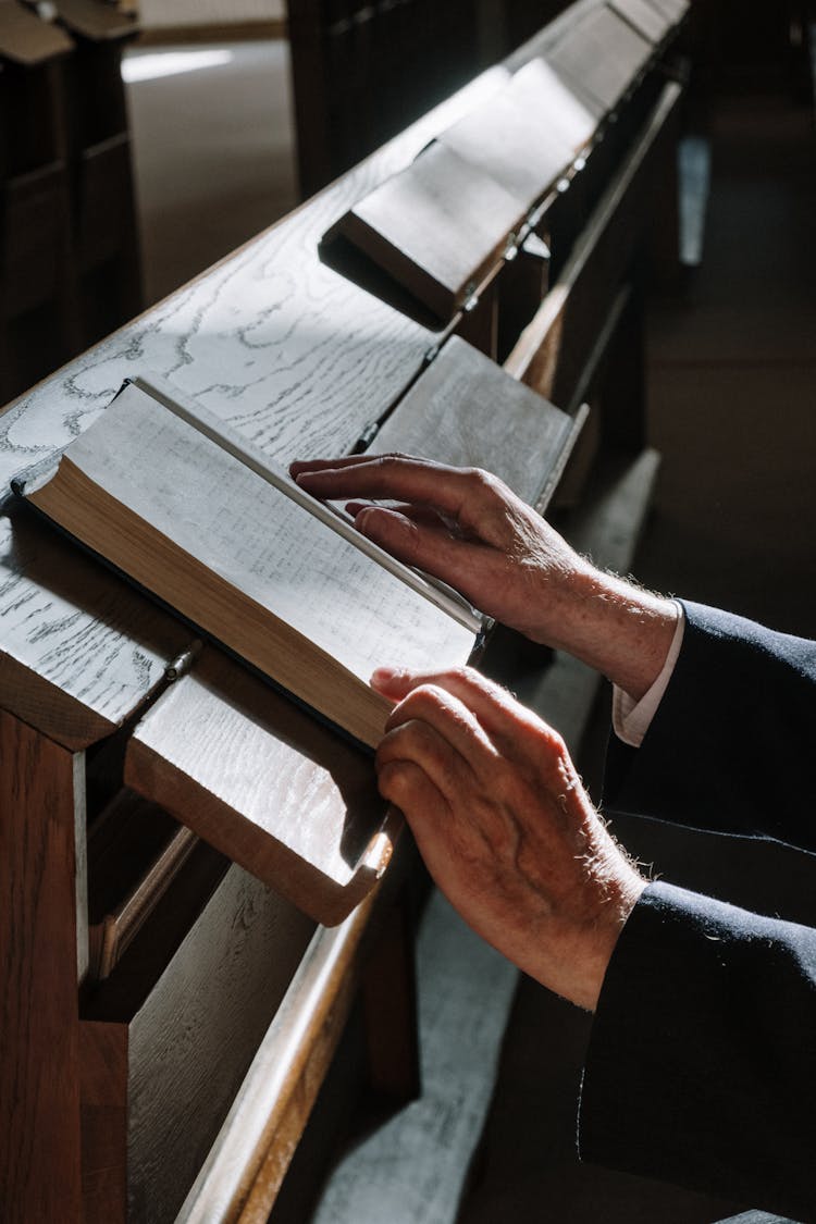 A Person Reading A Book