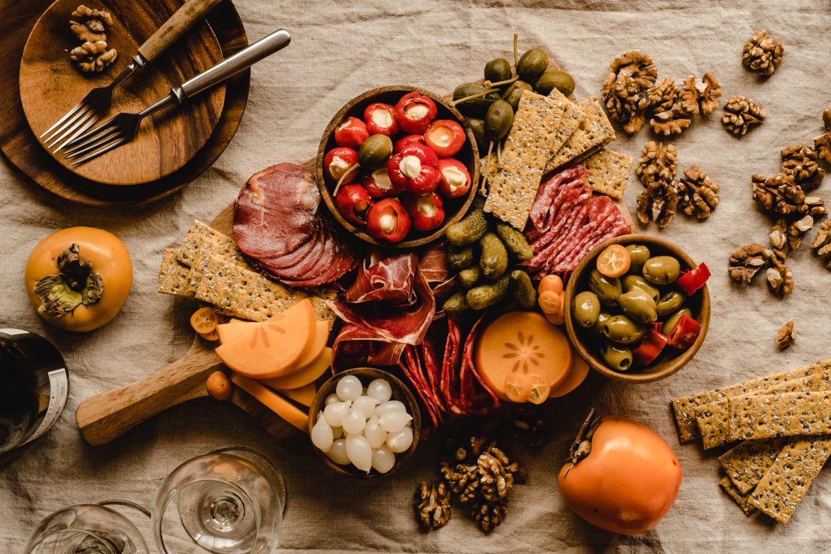 A rustic Corsican charcuterie board on warm linen