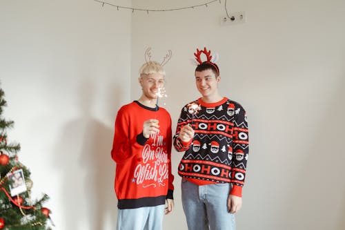 A Couple Wearing Christmas Sweater