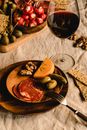 Wooden Plates Beside a Wine Glass
