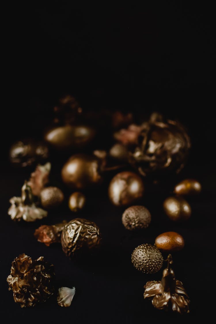 Brown And Black Round Fruit