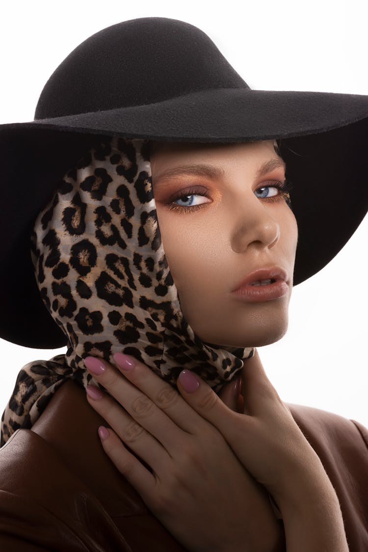 Trendy Woman In Hat And Headscarf With Leopard Print