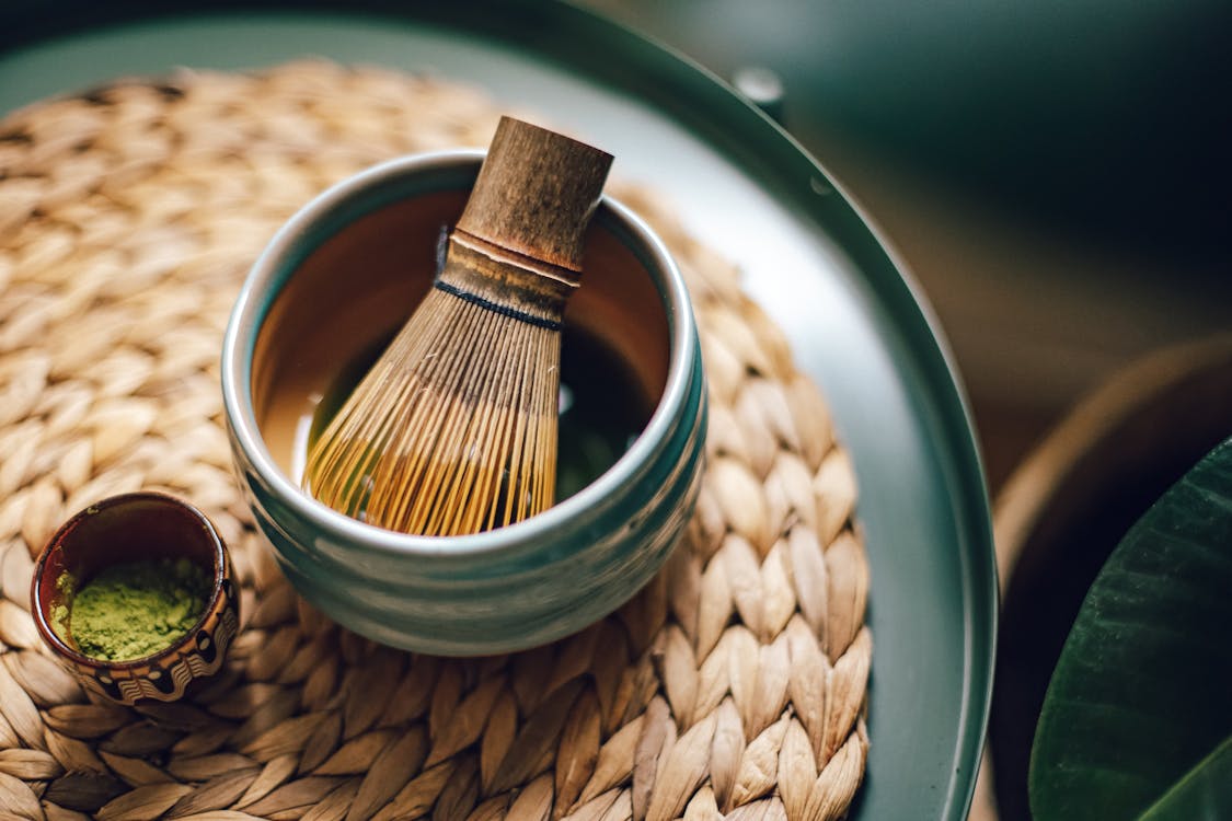 Free Bamboo Whisk in Ceramic Bowl Stock Photo