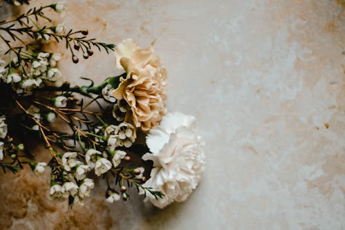 A Bunch of Flowers on Marble Surface