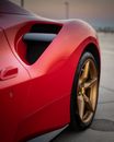 New shiny automobile with modern design of wheel on blurred background of city