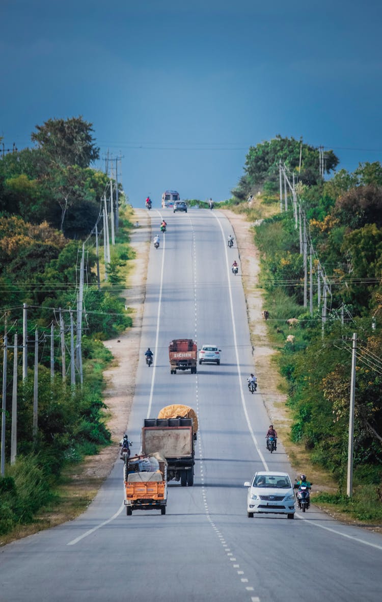 Vehicles On An Uphill Road