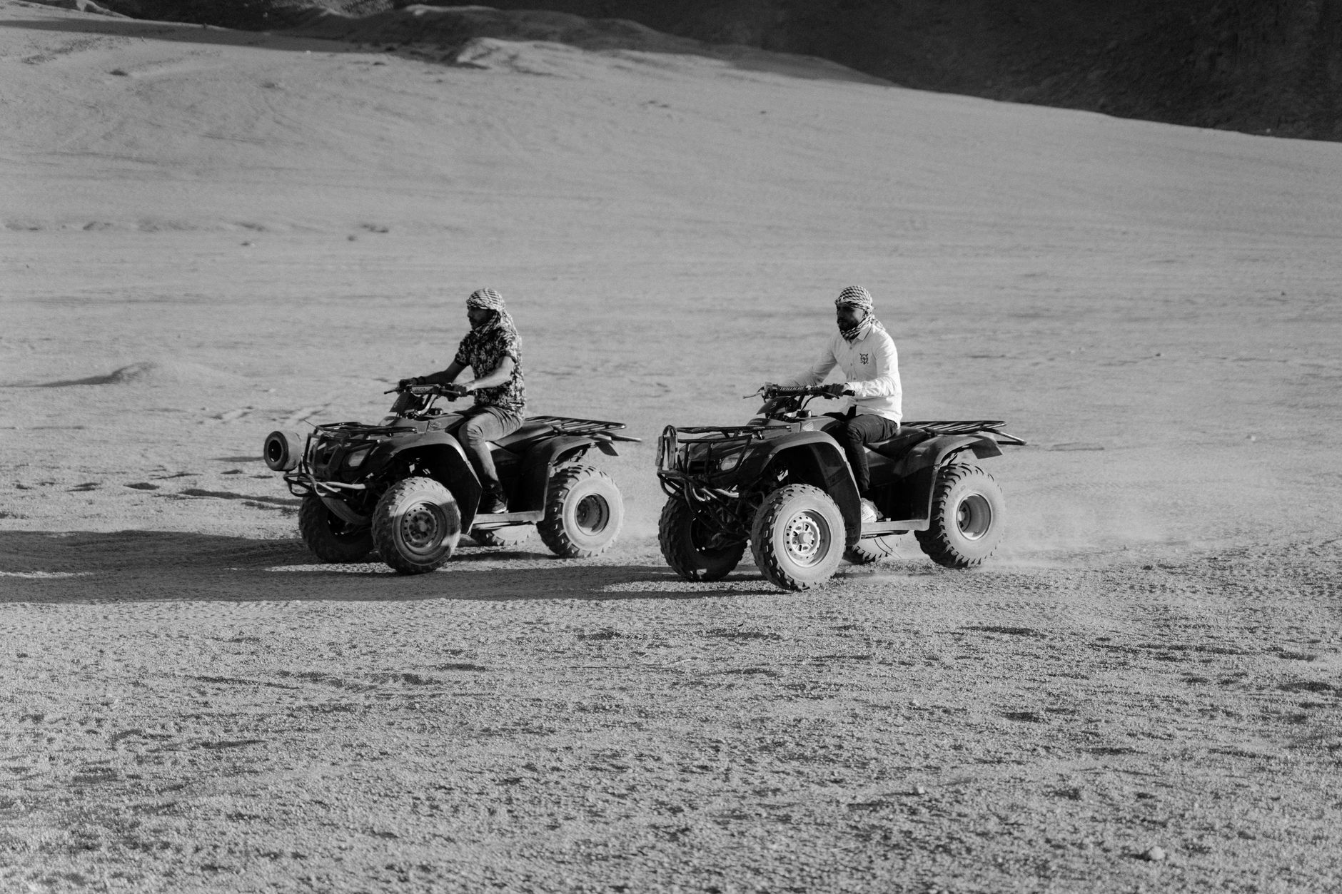 Men Riding All Terrain Vehicles