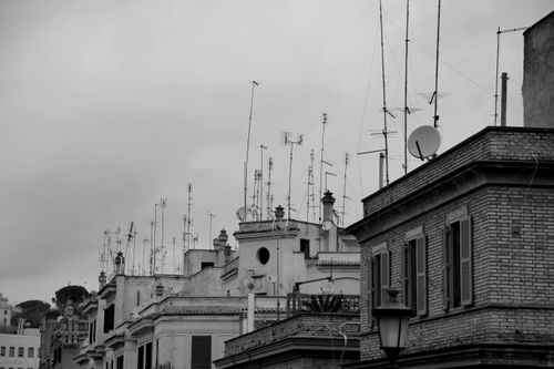 Rooftop aerials above old apartment blocks — photo by Nikita Belokhonov on Pexels