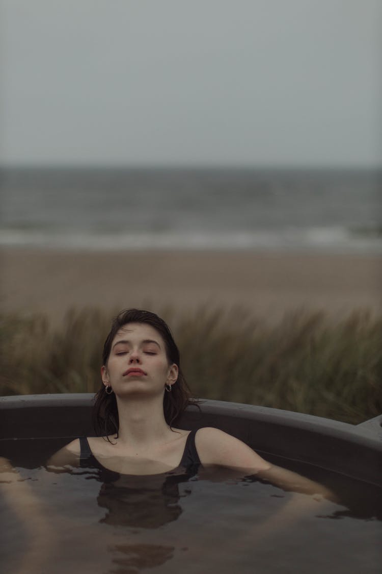 Woman Relaxing In The Jacuzzi