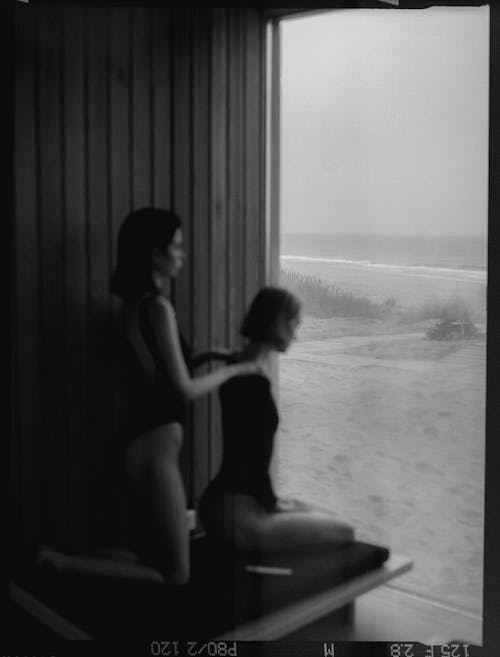 Grayscale Photo of Two Women Wearing Swimsuits