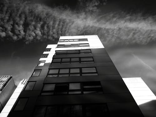 Grayscale Photograph of High-rise Building