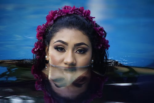 Woman with Makeup Looking out of Water