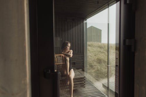 A Woman Wearing a Bikini Sitting