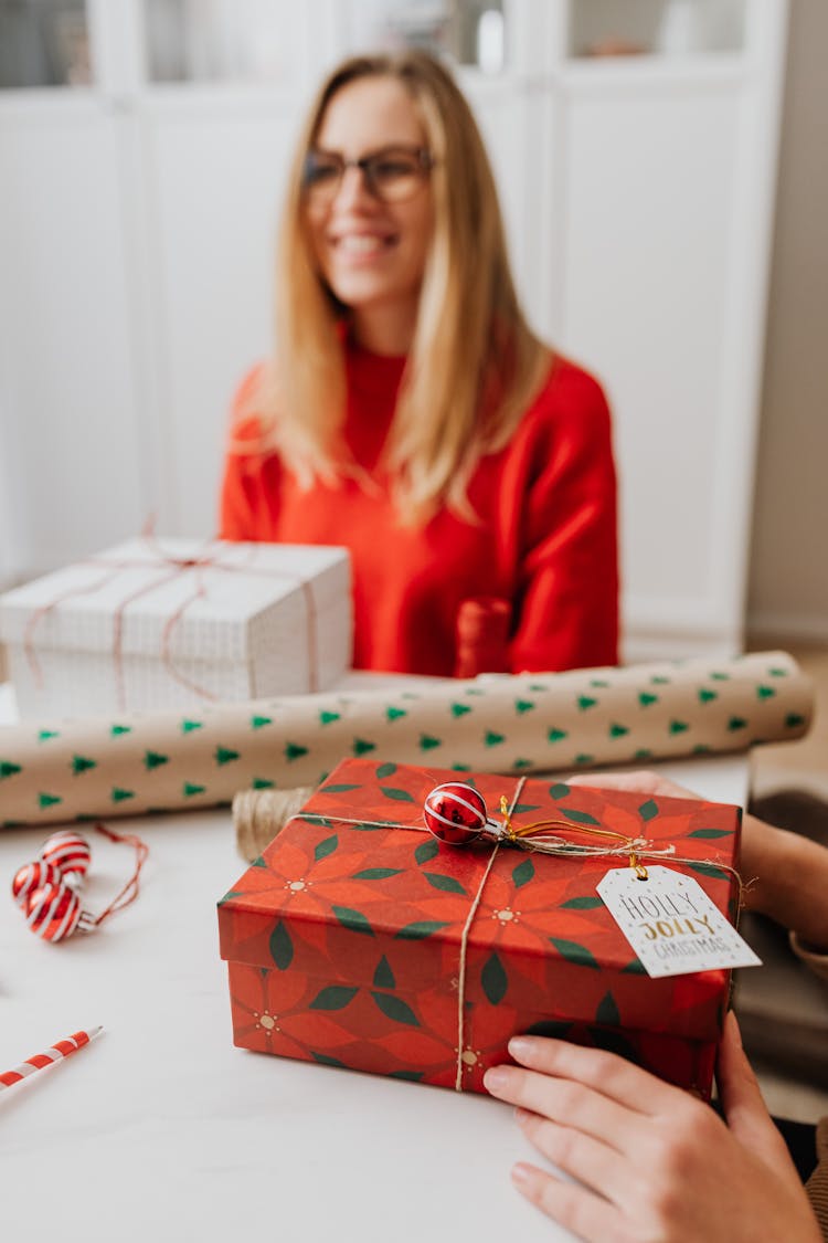 Women Wrapping Christmas Presents