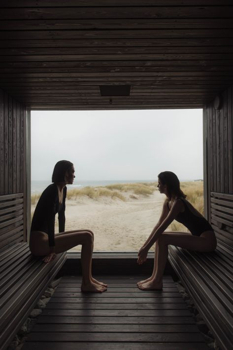 Contrast Therapy: How Hot-Cold Exposure Affects Your Nervous System 1 Two women relaxing in a seaside sauna