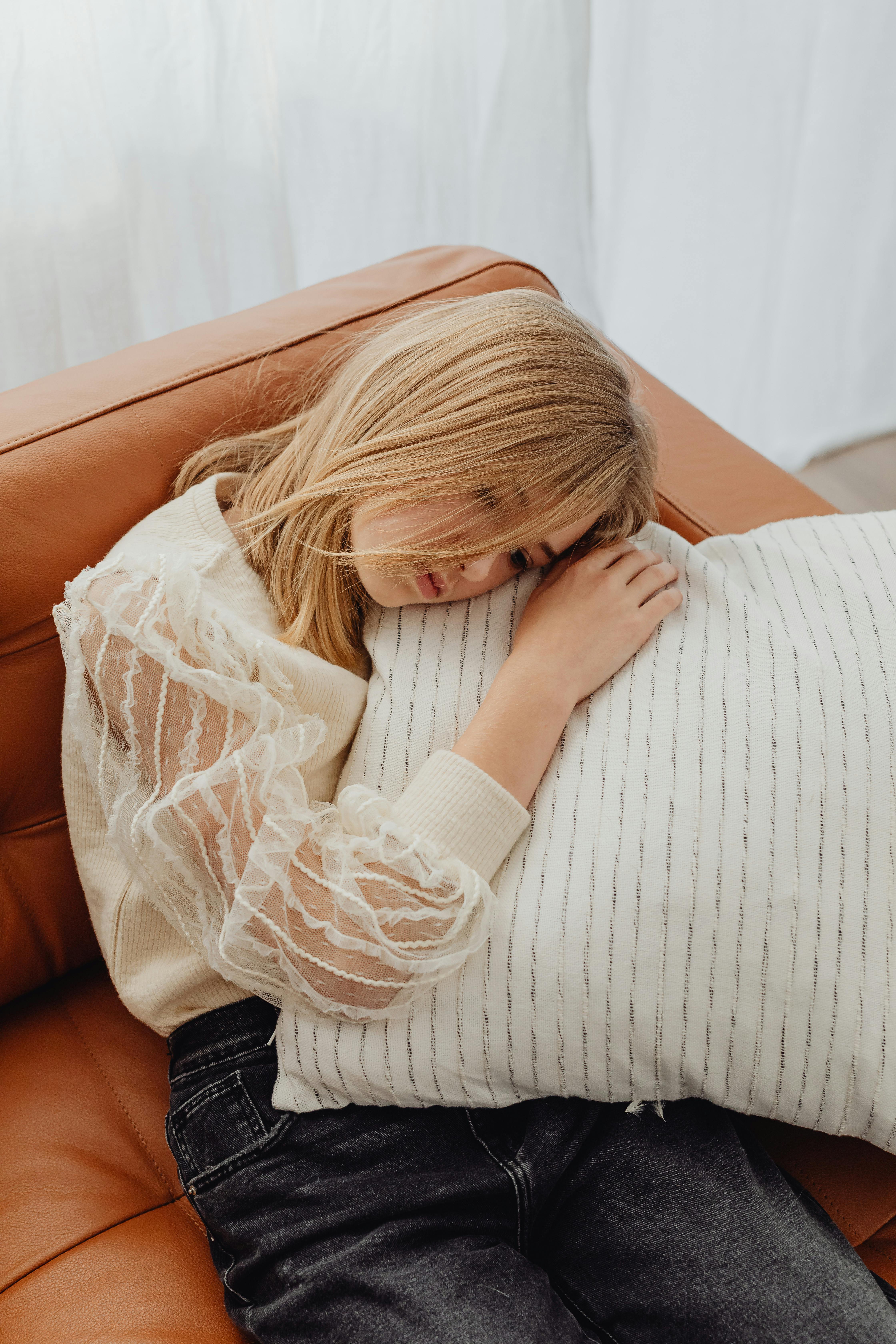 Girl Holding Pillow · Free Stock Photo