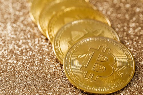 Бесплатное стоковое фото с bitcoins, золотой, монеты