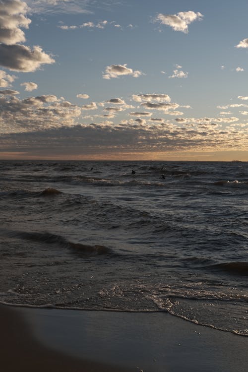 Waving sea at sunset time