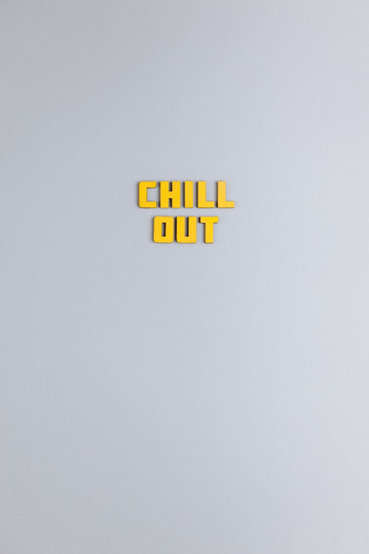 Yellow Chill Out Words On Gray Background 