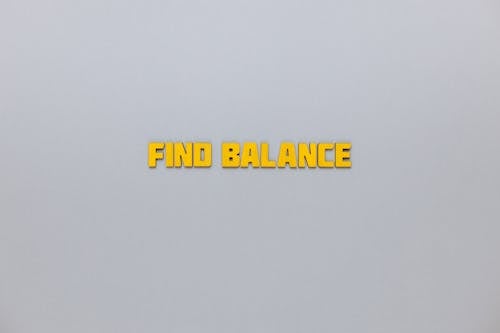 Text Saying "Find Balance" Made out of Yellow Letters 