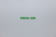 Peace Out Words Created From Green Scrabble Tiles