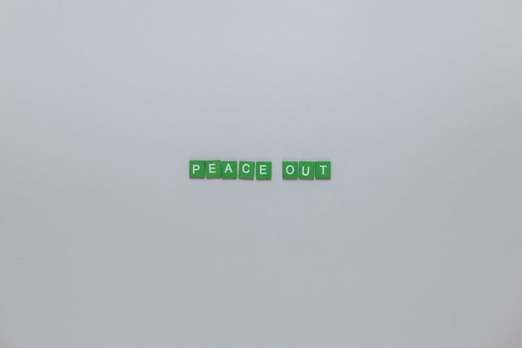 Peace Out Words Created From Green Scrabble Tiles