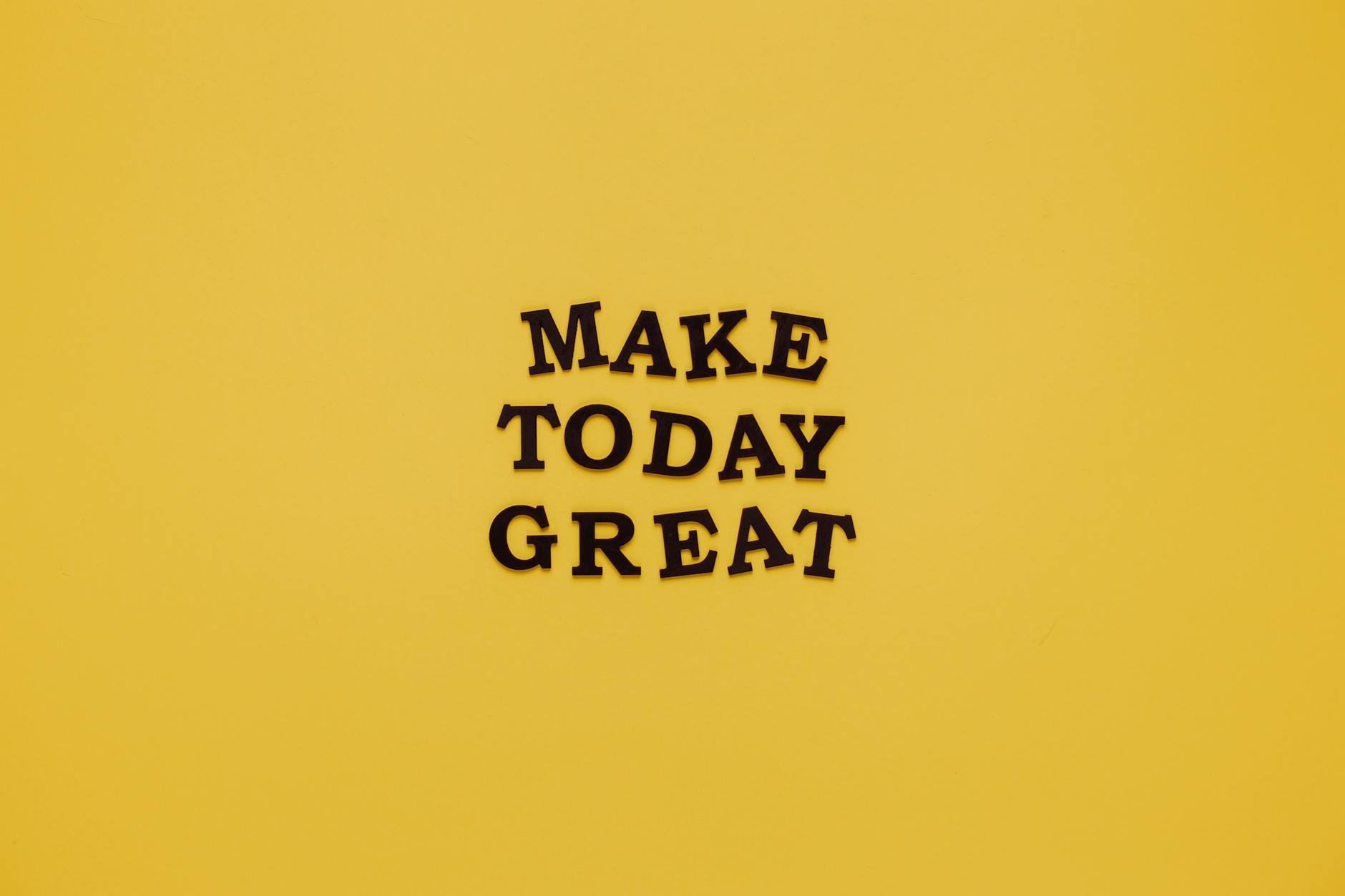 Motivational Quote on Yellow Background