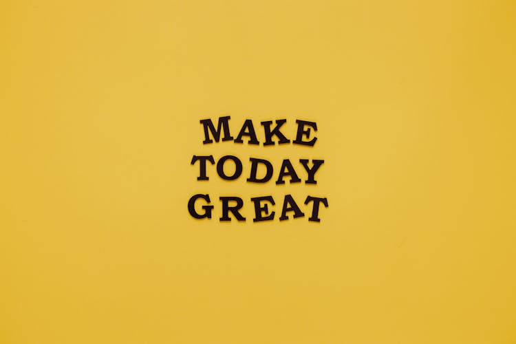 Motivational Quote On Yellow Background