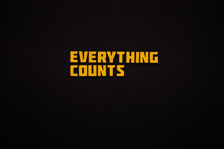 Bold yellow text 'EVERYTHING COUNTS' on a black background, emphasizin — Photo by Thirdman on Pexels
