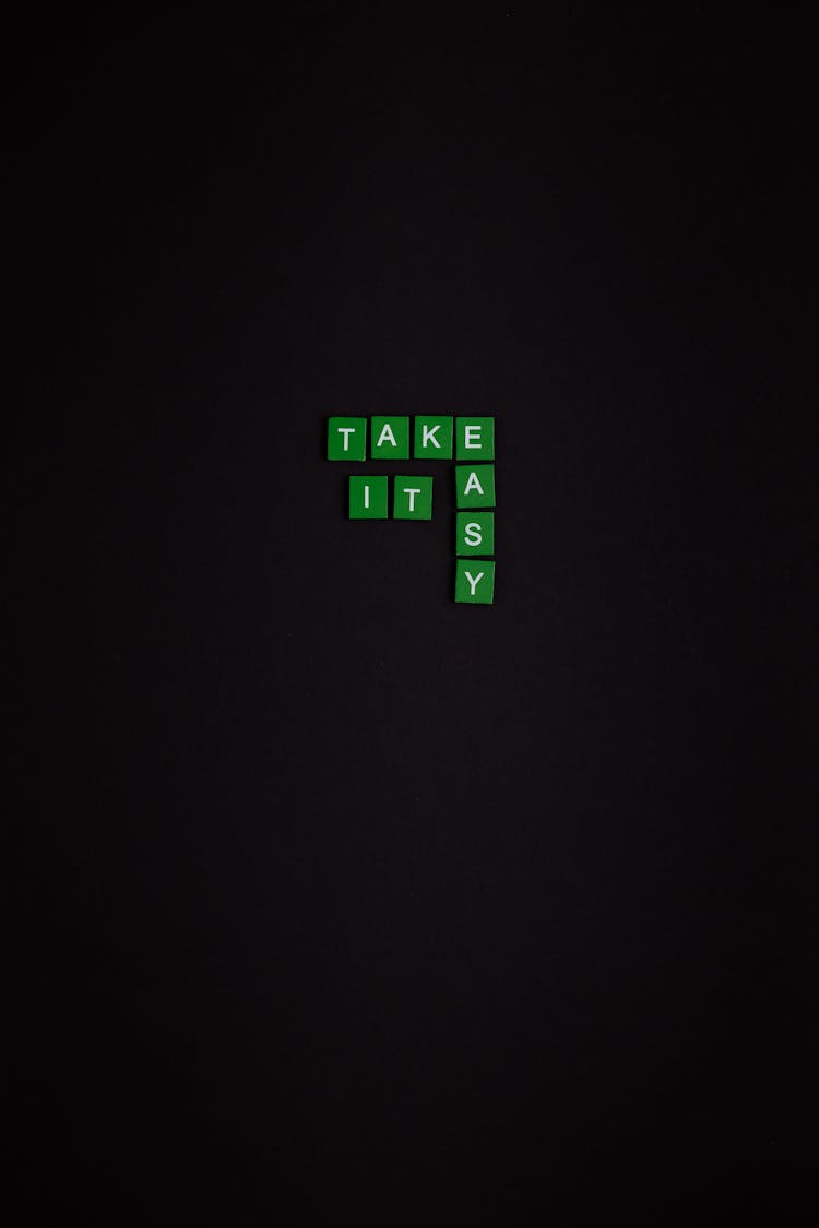 Green And White Text Based Tiles On Black Background