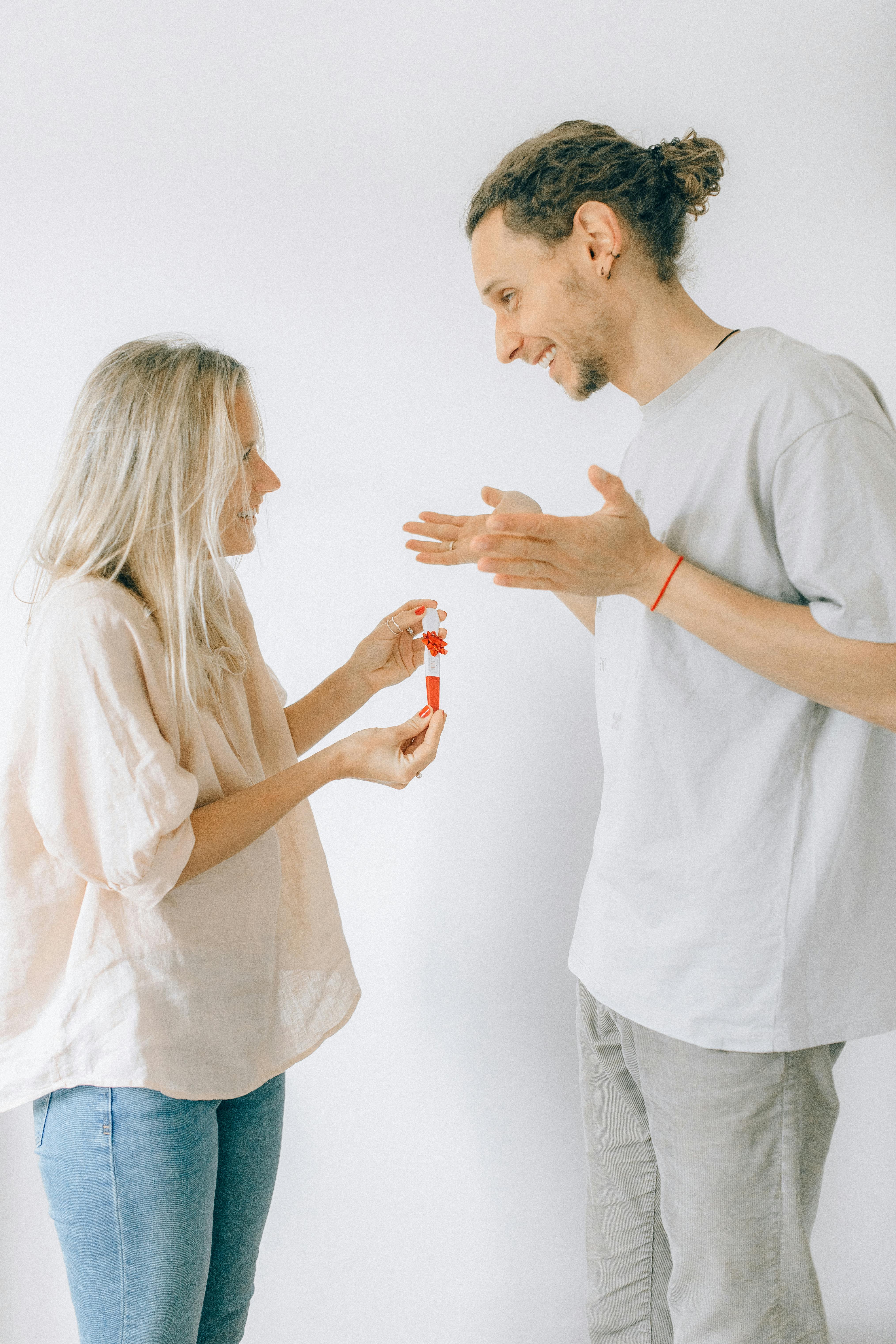 man in white t shirt and woman in white t shirt